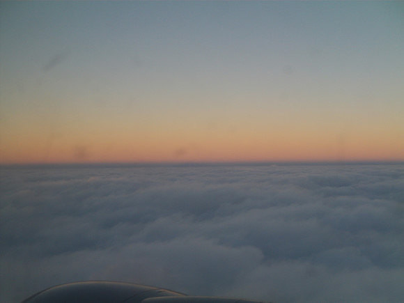 回家事,飞机上拍的晨昏线.